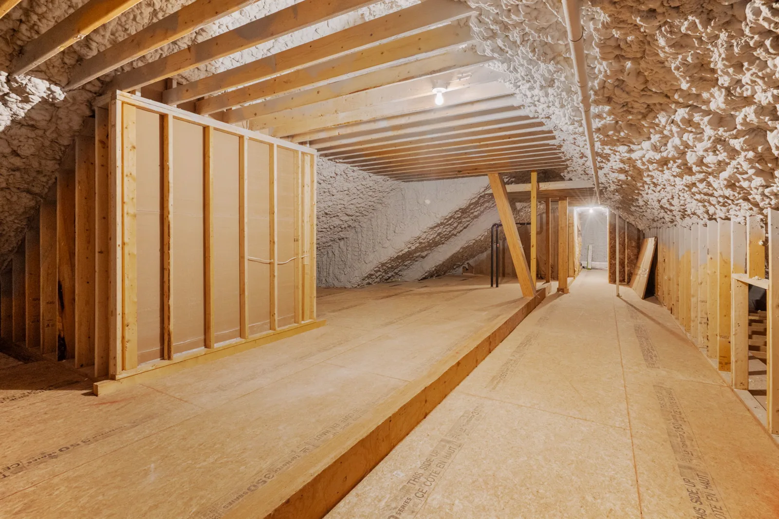 Framed walk-up attic with insulation and subfloor