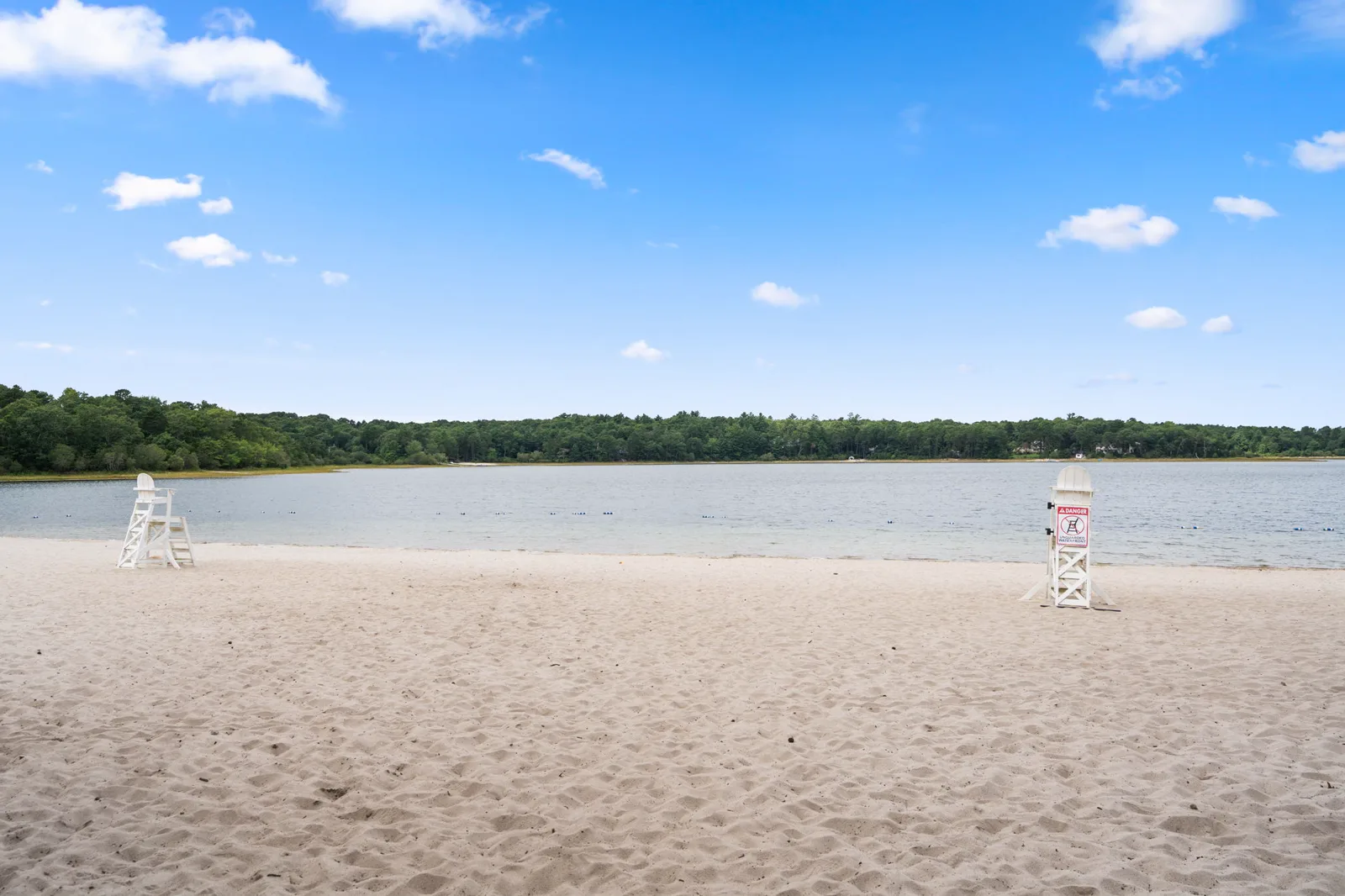 Sandy freshwater beach at Snake Pond near the house