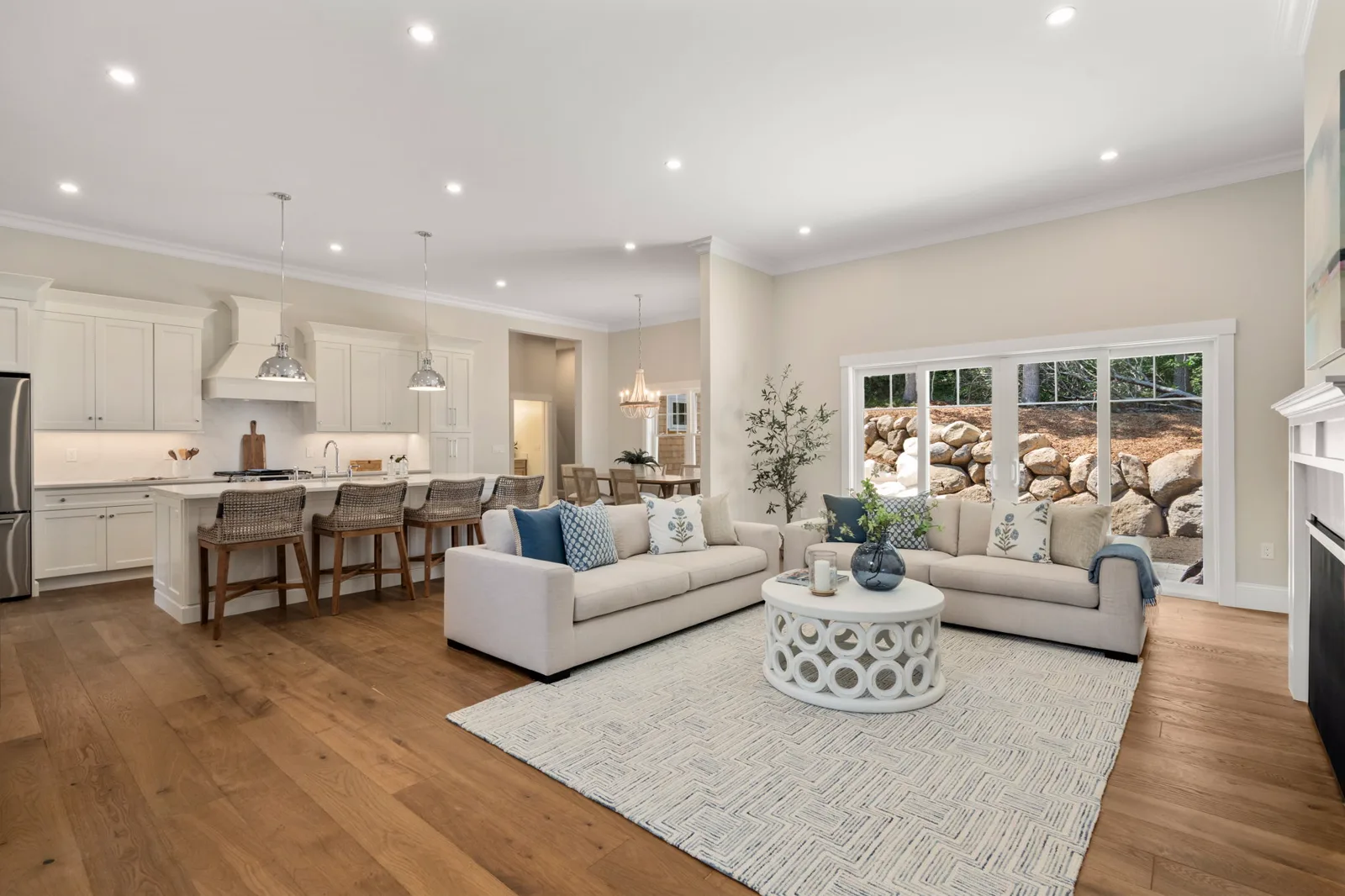Open-plan living room looking through to the kitchen